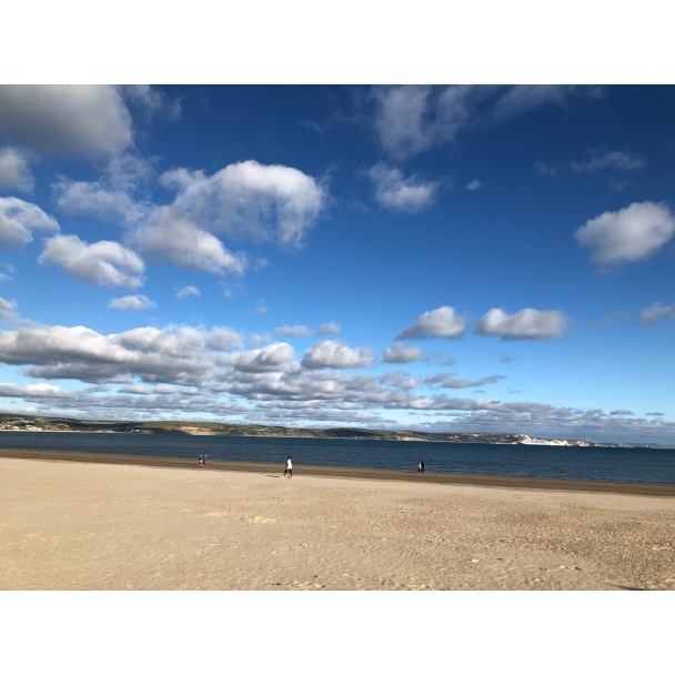 Clouds over Weymouth Beach Photographic Poster